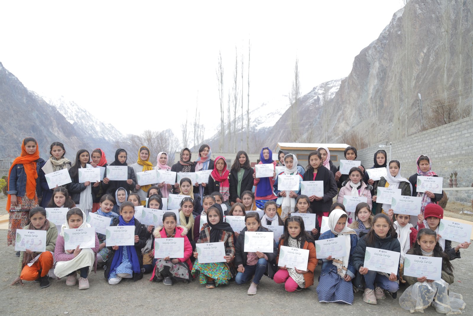 Saheli Circle graduates holding their completion certificates
